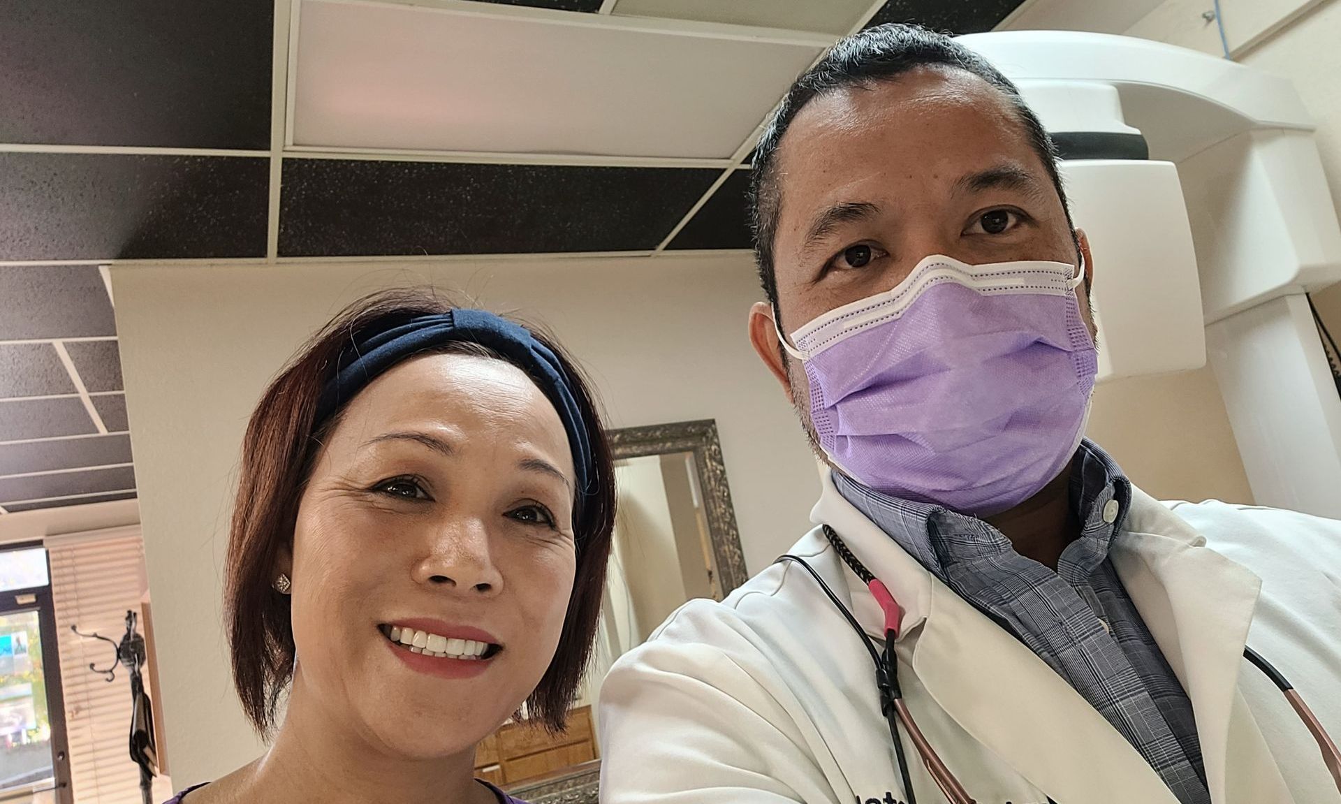 murieta and dentist smiling