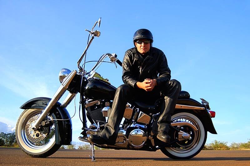 Man Sitting On Motorcycle — Motorcycle Insurance in Marietta, GA
