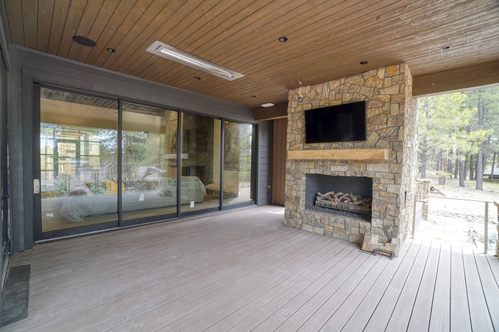 Expansive deck with views of the beautiful forest and golf course.  
