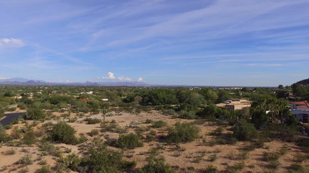 Arguably the best view lot in Paradise Valley, this lot boasts views in all directions.  This 8000 sq foot custom luxury home  will be the envy of the neighborhood featuring one of the largest and most functional pantries and well designed kitchens. The entire home will be designed with healthy living in mind from material choices to mitigating the health impact from wi-fi and cell usage. Cutting edge technologies and building techniques will be employed to address the preferences and to reflect what is important to this wonderful couple.  
