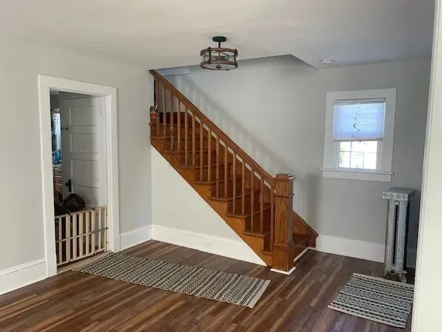 There is a staircase in the middle of the room.