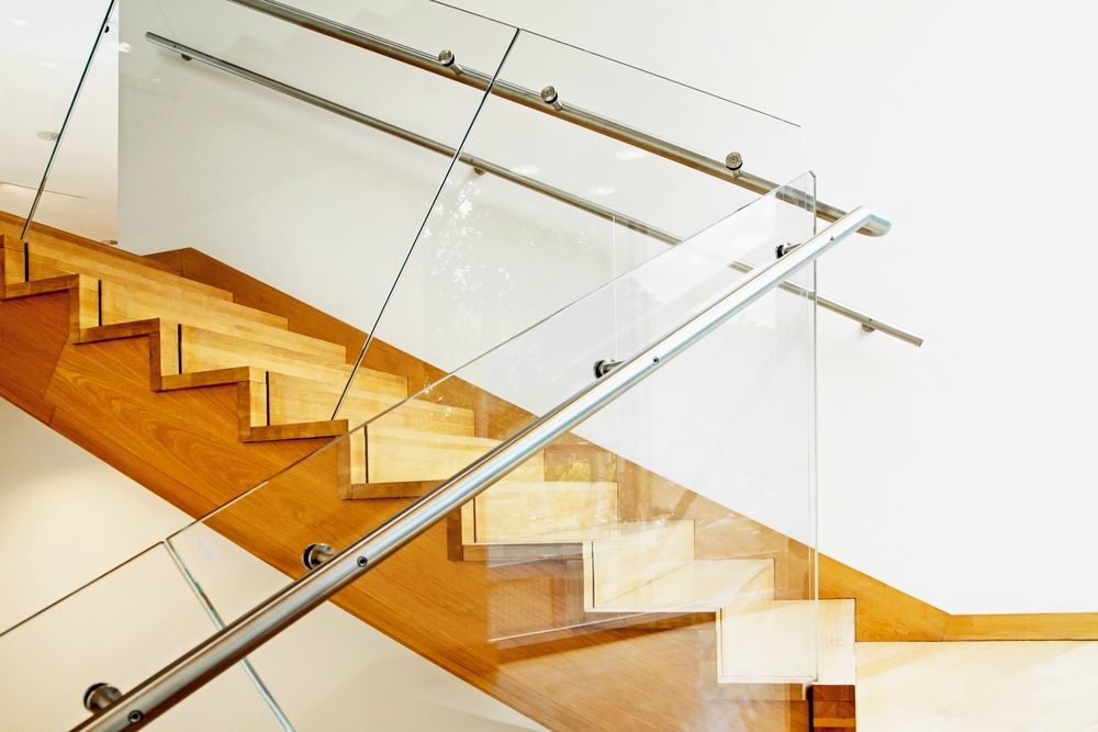 A Wooden Staircase With A Clear Glass Railing — All About Glass Lake Macquarie In Ellalong, NSW