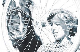 A bicycle wheel framed over the faces of a person and a horse, both appearing in black and white.