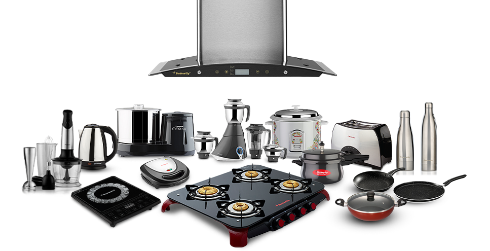 Kitchen appliances arranged together, including a range hood, stove, blender, toaster, and kettle.