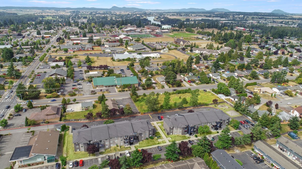 An aerial view of a residential area with lots of houses and trees.