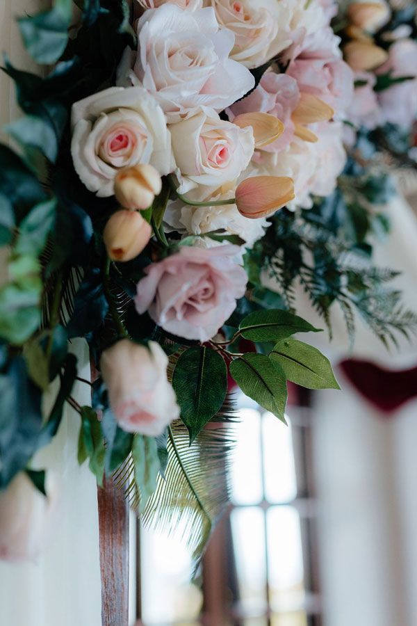 A Close Up of a Vase Filled With Pink and White Roses — Prim n Proper Event Hire in Palmview, QLD