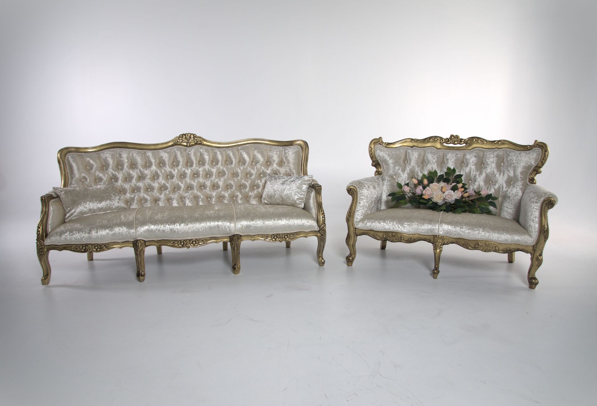 A Couch and a Chair Are Sitting Next to Each Other on a White Surface — Prim n Proper Event Hire in Palmview, QLD