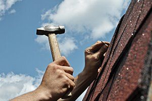 Roofer Fixing Roof - Home Repairs in Hanover Park, IL