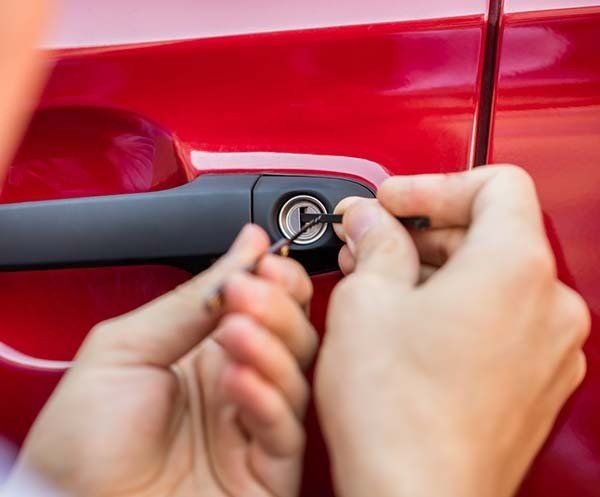 Person's Hand Opening Car Door — Coast 2 Coast Locksmiths in Buderim, QLD