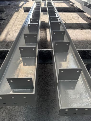 Steel beams with wet paint