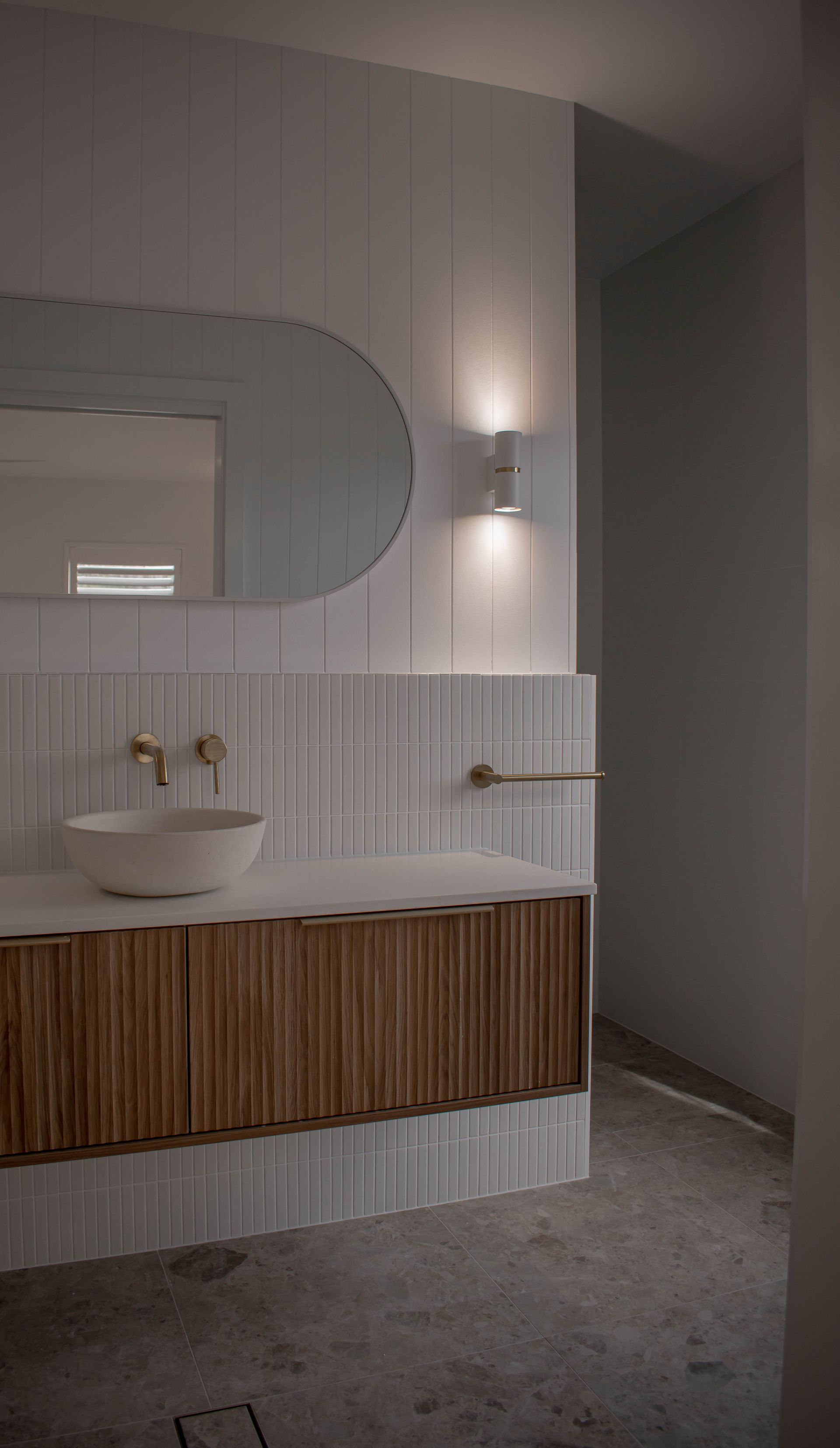 A Person is Fixing a Smoke Detector With a Screwdriver — Anderson Electrical & Air in Taree, NSW