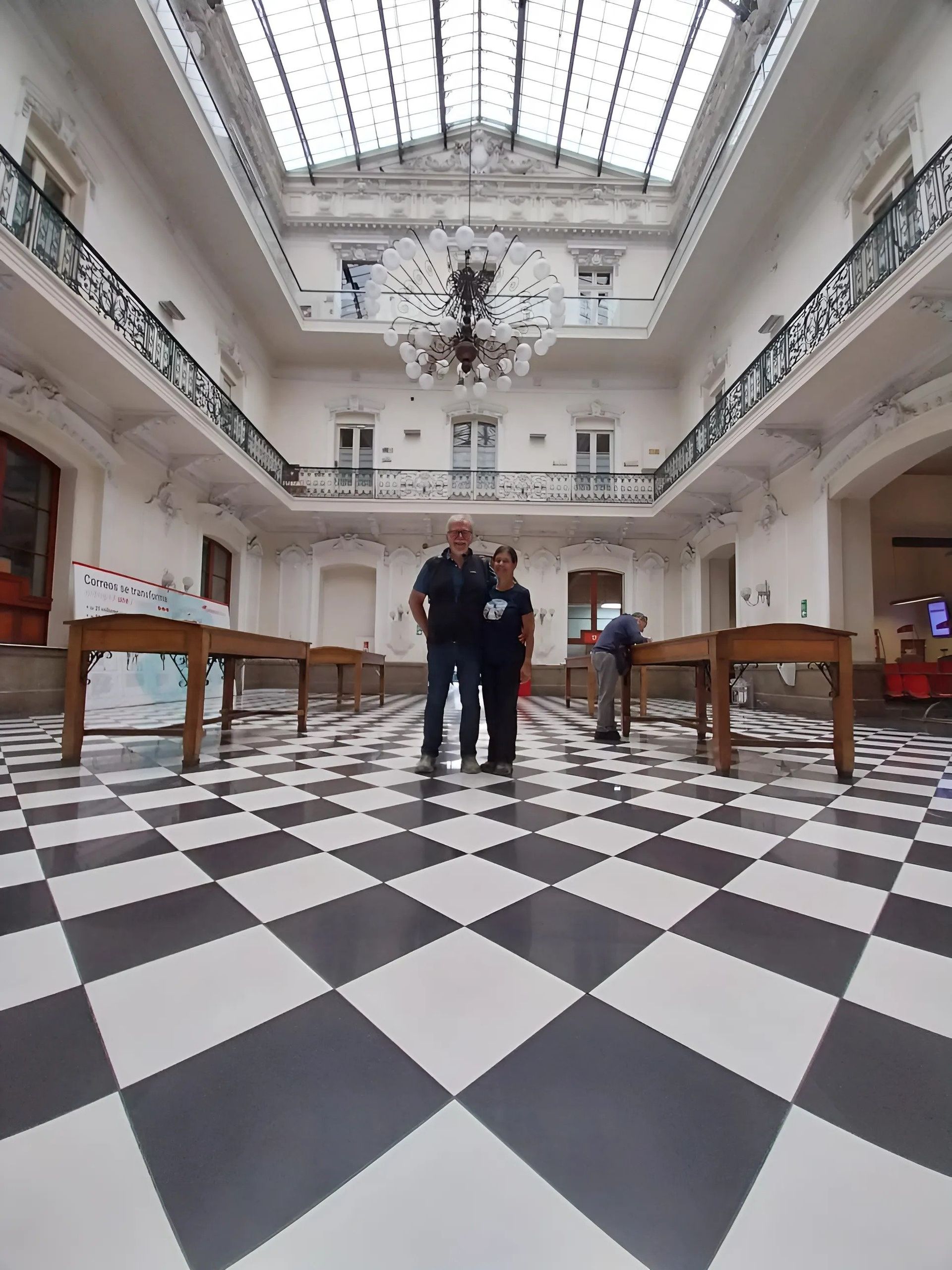 A couple posing in a room at the Fine Arts Museum in Santiago de Chile