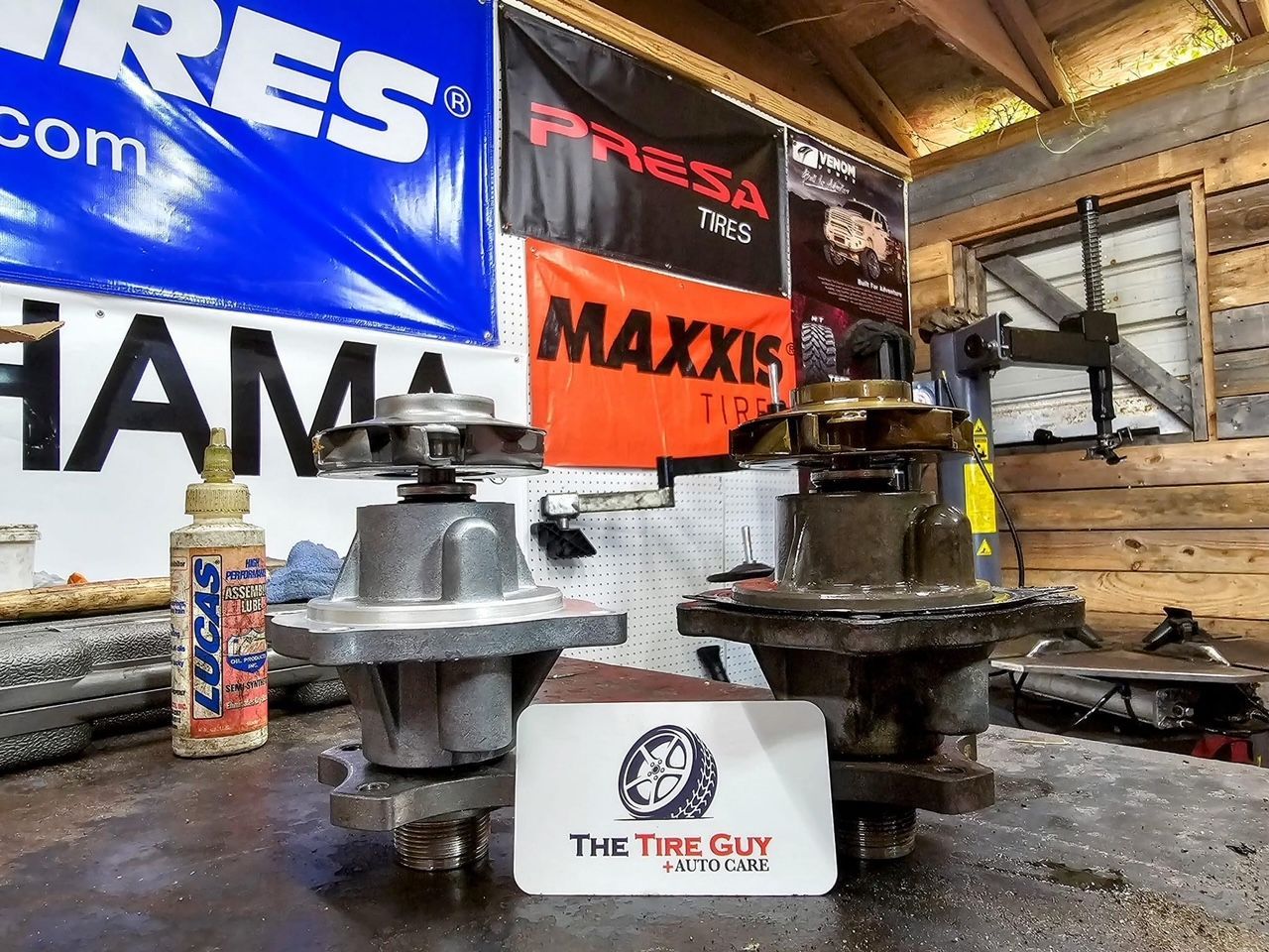 A white card that says the tire guy on it