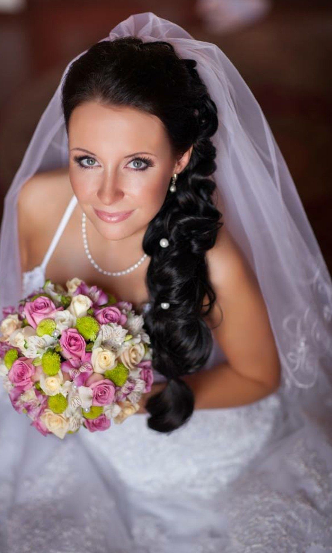 bride from above holding flowers