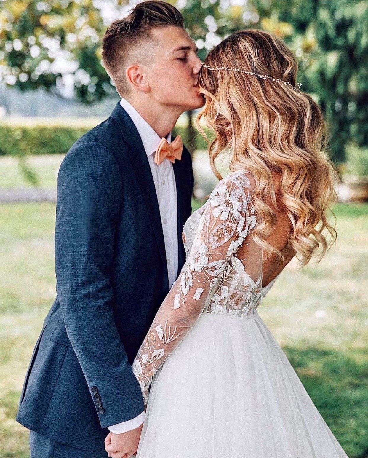 groom kissing bride