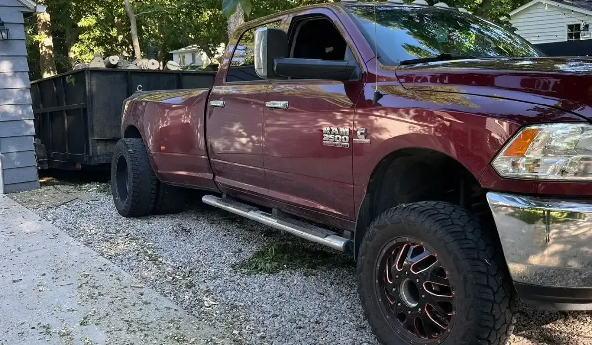 Heavy-duty RAM 3500 tree removal truck operating in Iowa