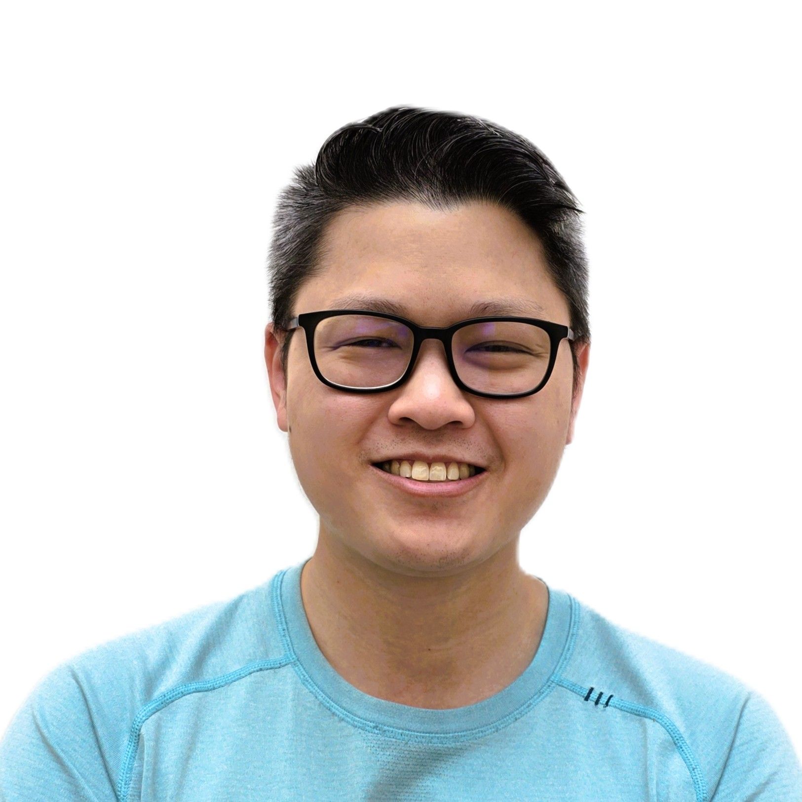 A man wearing glasses and a bow tie is smiling.