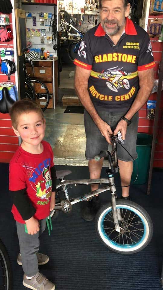 A Kid Buying his Bike — Gladstone Bicycle Centre in Gladstone, QLD