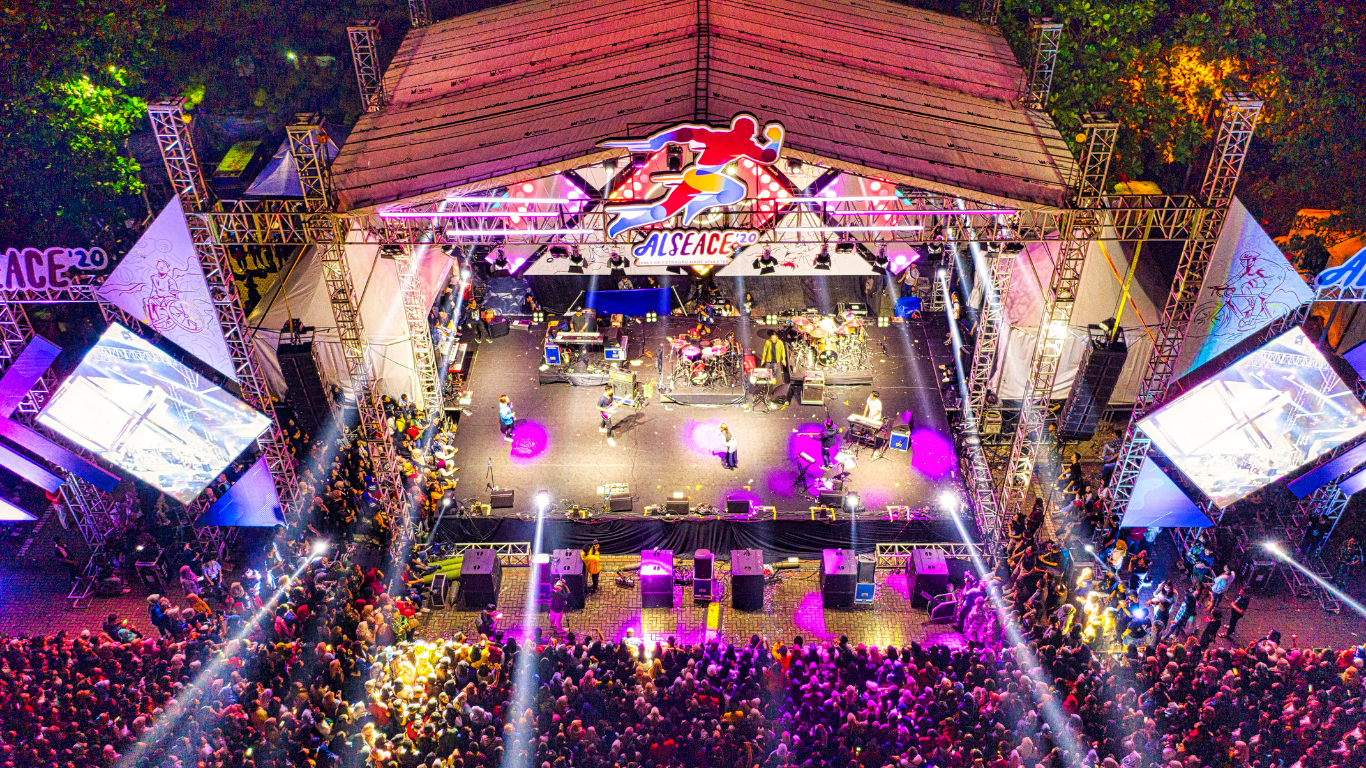 An aerial view of a crowd of people at a concert.