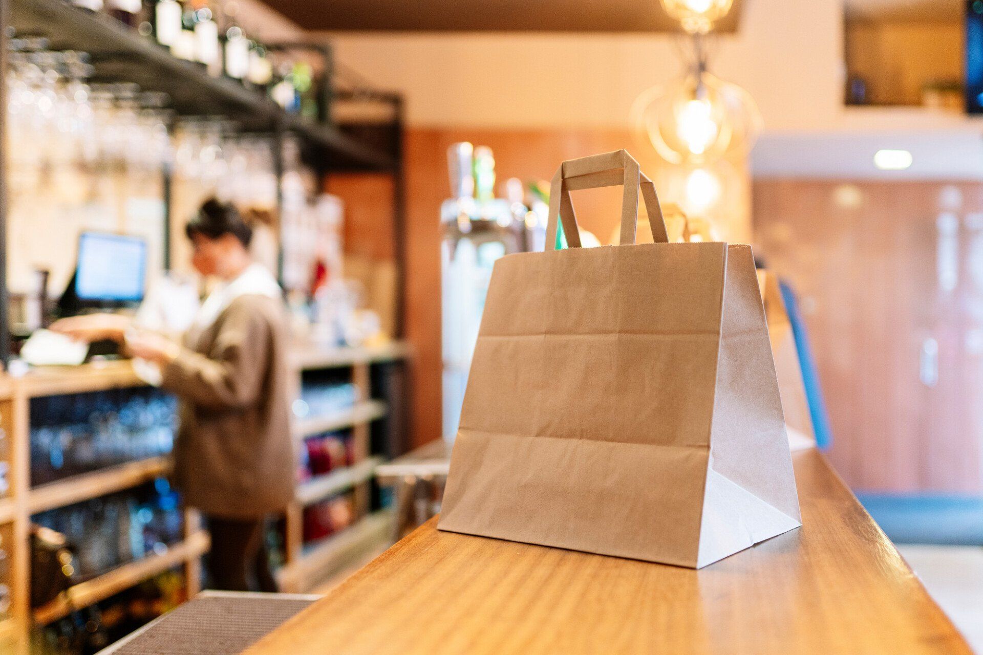 A restaurant prepares food to serve at home.