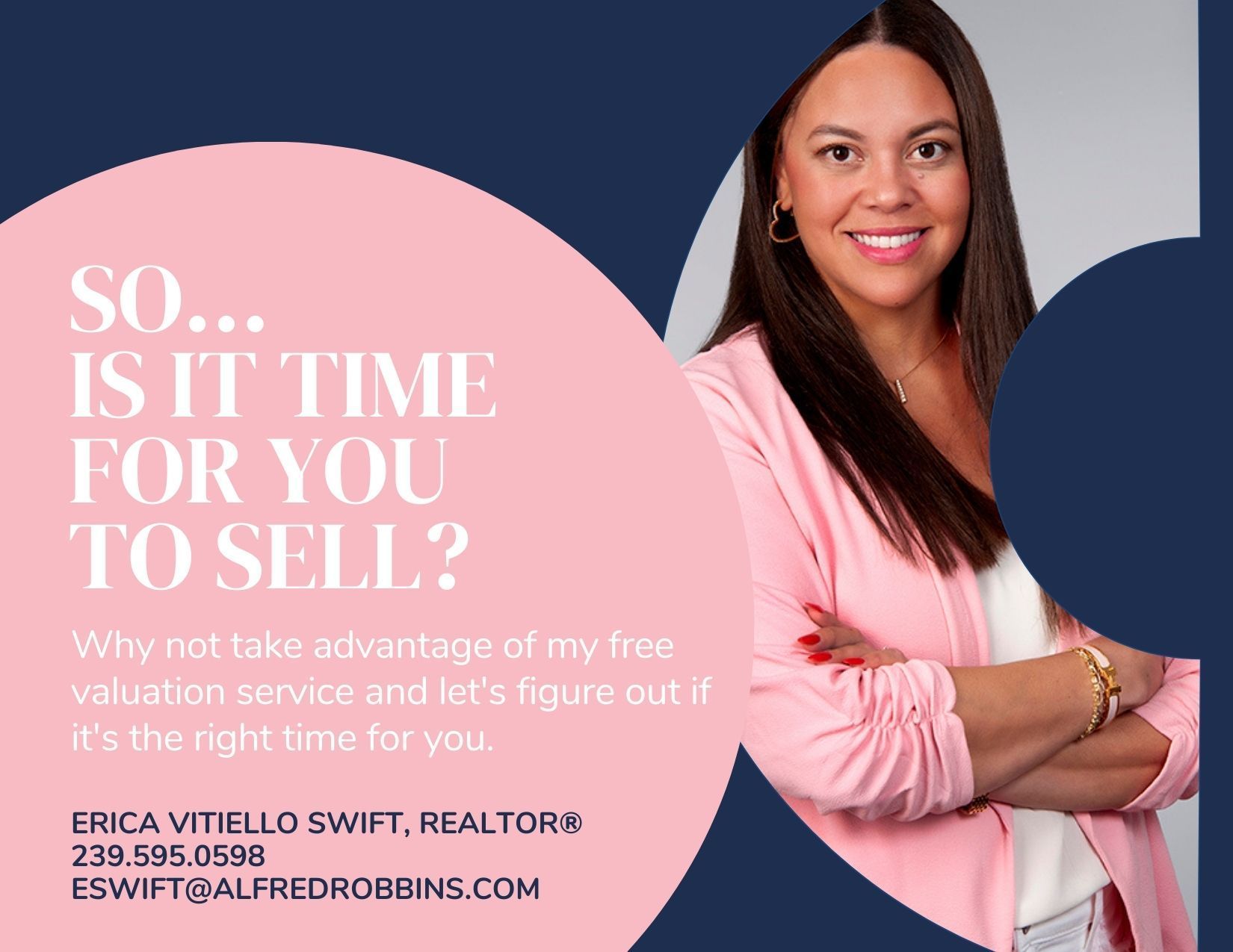A dining room with a round table and chairs.