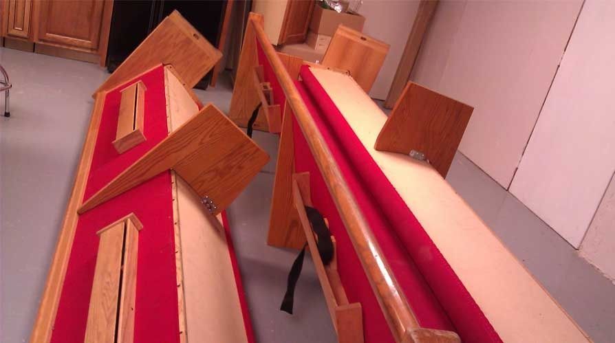 A wooden table with a red cloth on it