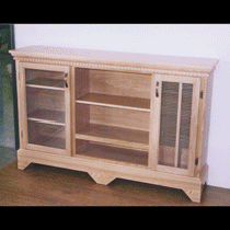 A wooden cabinet with glass doors and shelves