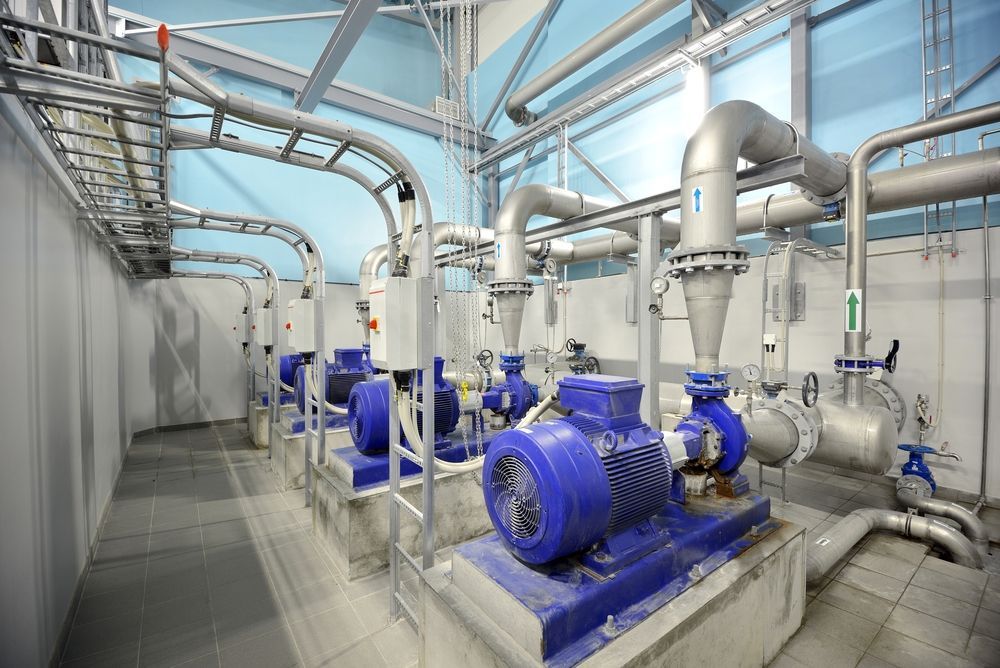 A Room Filled With Lots of Pipes and Pumps — Proton Engineering Pty Ltd In Gunnedah, NSW