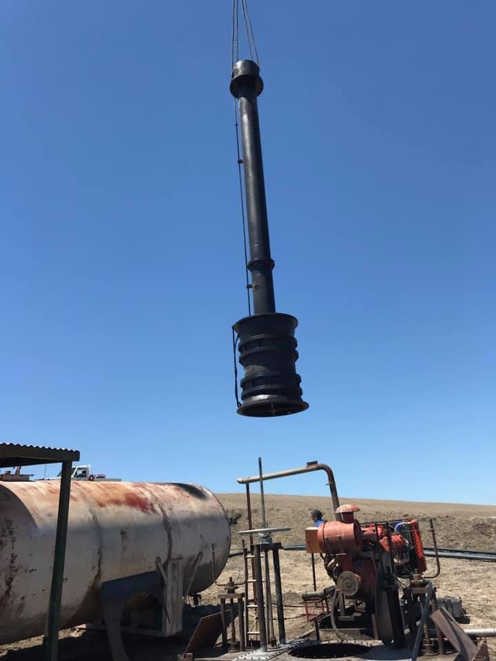 Pump Being Lifted by a Crane — Proton Engineering Pty Ltd In Wee Waa, NSW