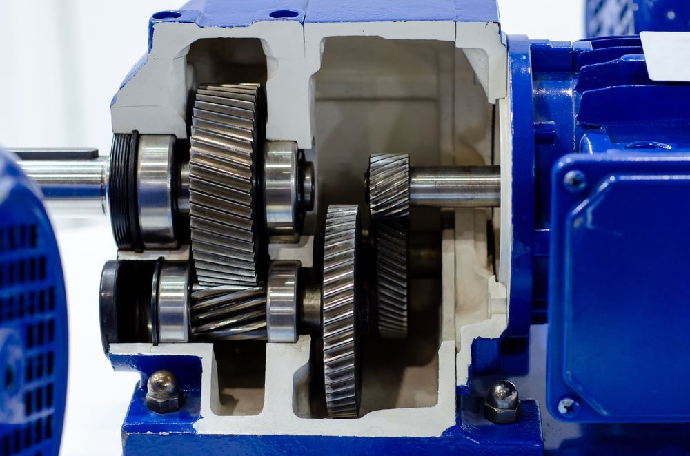 A Close Up of a Blue Gearbox on a White Background — Proton Engineering Pty Ltd In Tamworth, NSW