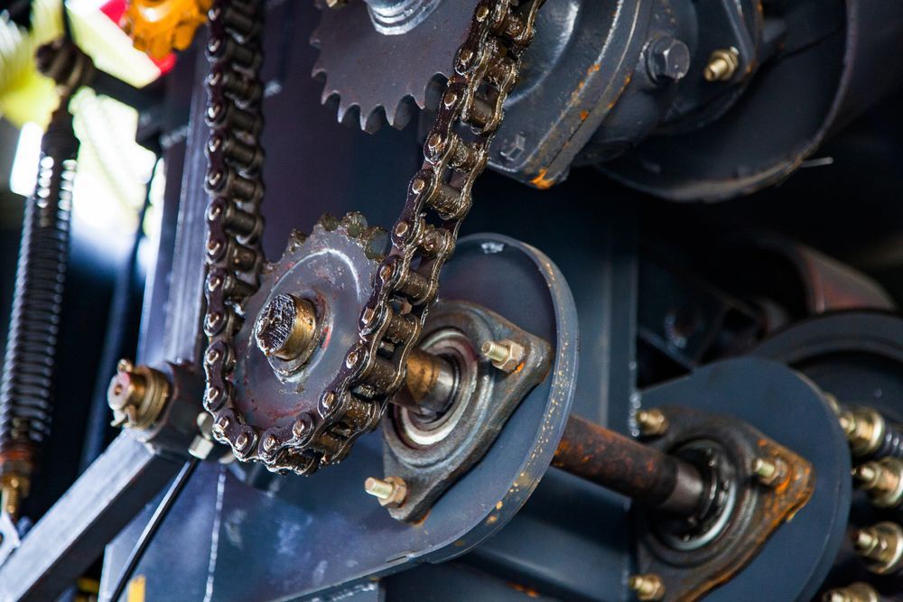 A Close Up of a Gear and Chain on a Machine — Proton Engineering Pty Ltd In Narrabri, NSW