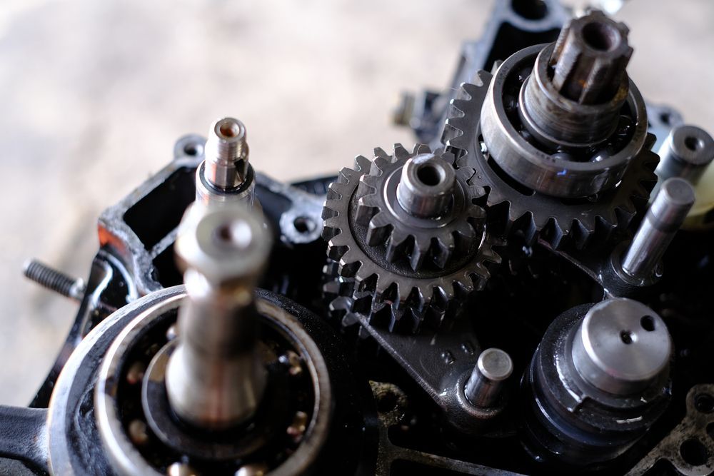 A Close Up of an Engine With Gears and Bearings — Proton Engineering Pty Ltd In Tamworth, NSW