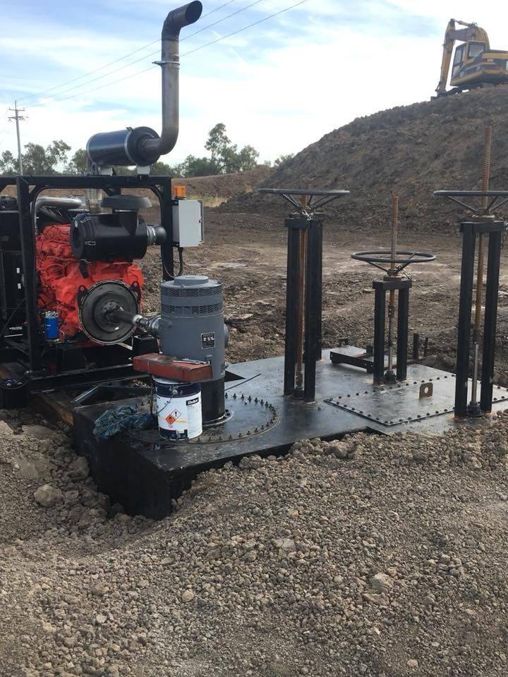 A Large Engine is Sitting in the Middle of a Dirt Field — Proton Engineering Pty Ltd In Moree, NSW