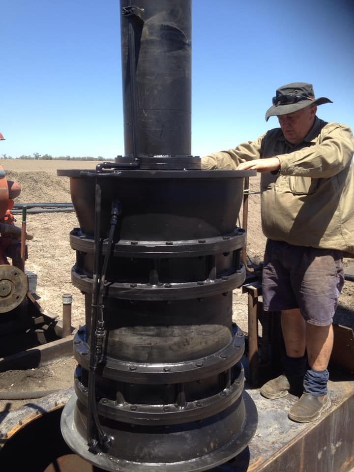 Worker Carrying Out Pump Inspection — Proton Engineering Pty Ltd In Moree, NSW