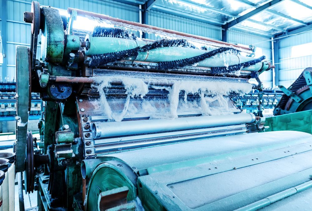 A Large Machine is Sitting Inside of a Building in a Factory — Proton Engineering Pty Ltd In Wee Waa, NSW