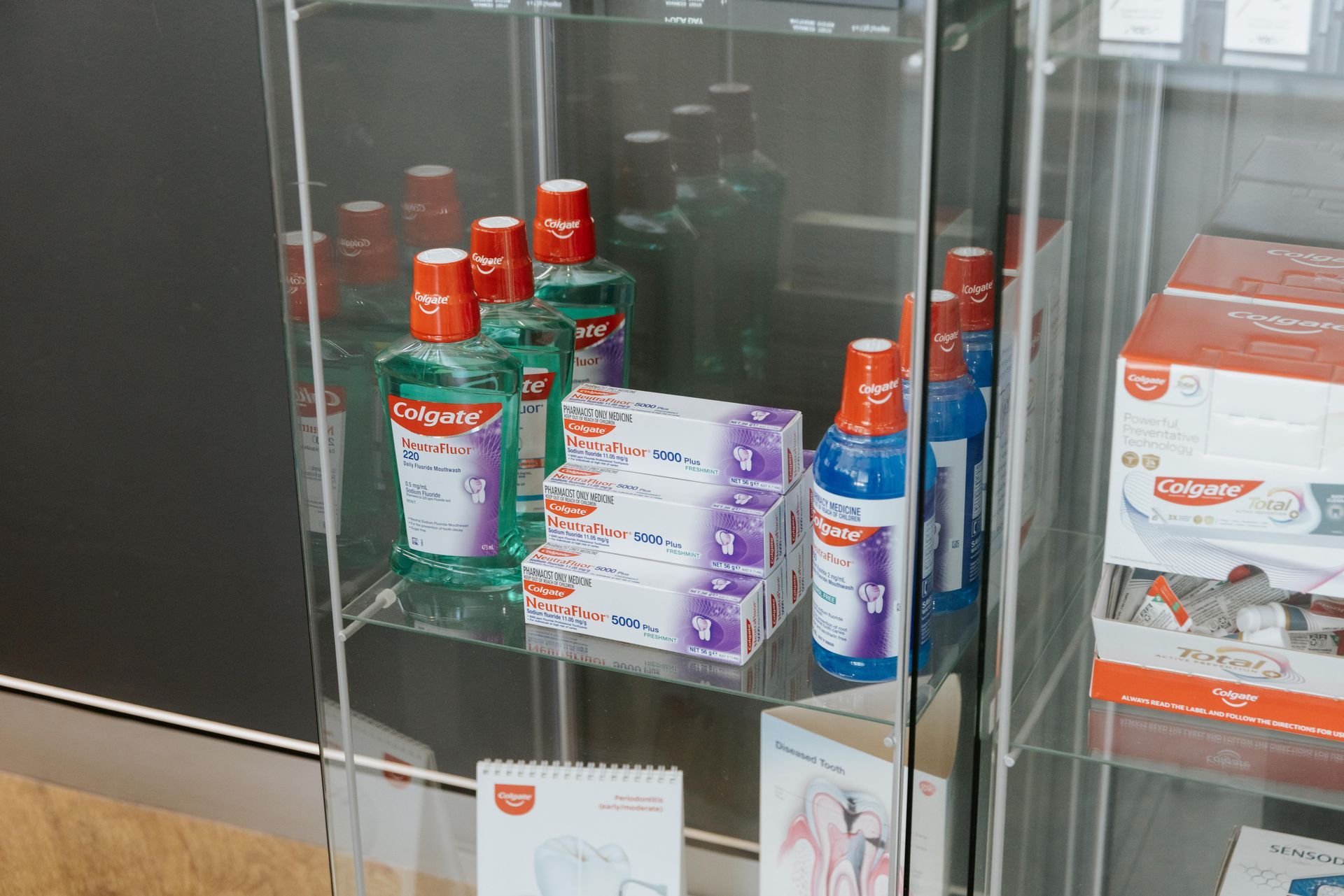 Display case with bottles of mouthwash and boxes of toothpaste. — McDonald Dental in Gympie, QLD