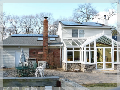 Front View of a house with Solar Panel System - Electric Contractors in Bay Shore, NY