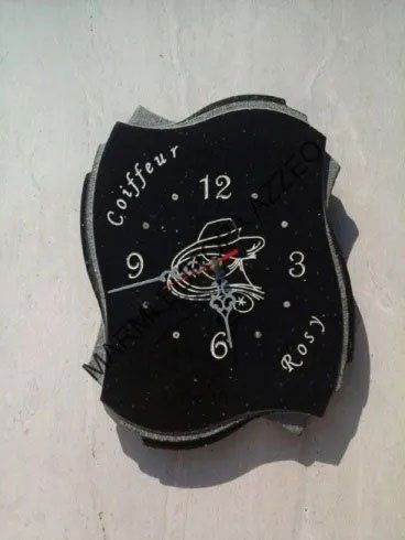 orologio da parete in granito scuro