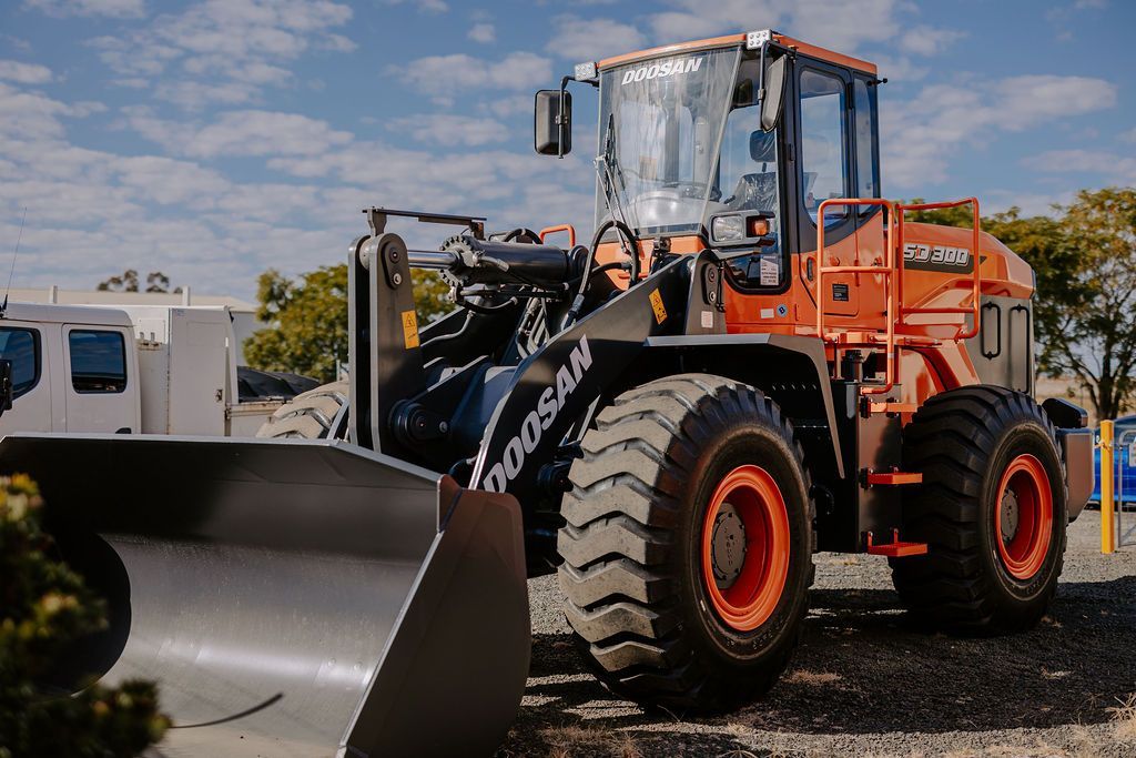 A Bulldozer Is Parked On The Side Of The Road — Tracserv in Mudgee, NSW