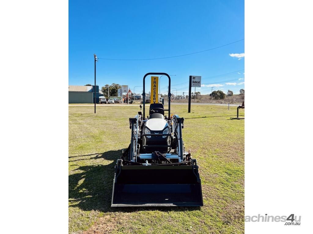 Small Front Loader With Black Bucket Parked — Tracserv in Dubbo, NSW