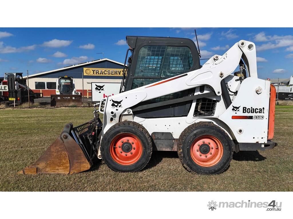 White Bobcat Skid Steer With Front Bucket — Tracserv in Dubbo, NSW