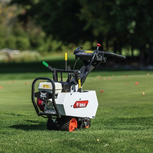 Bobcat Golf Ball Retriever on A Green Lawn, Orange Wheels — Tracserv in Dubbo, NSW