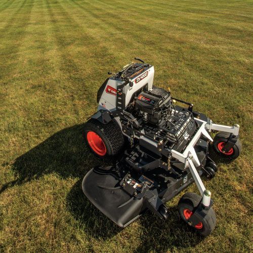 White and Black Zero-Turn Mower on Green Grass, Orange Wheels, Overhead View — Tracserv in Dubbo, NSW