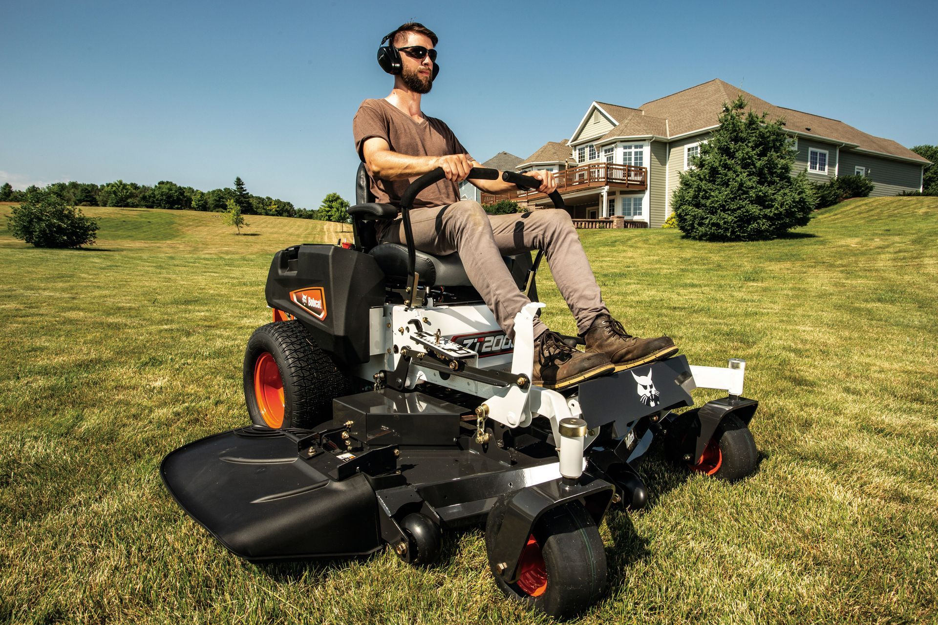 Man on a Zero-turn Mower Cutting Grass — Tracserv in Dubbo, NSW
