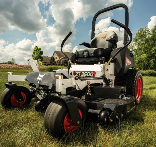 A Black And White Z3500 Lawn Mower Is Parked In A Grassy Field — Tracserv in Dubbo, NSW