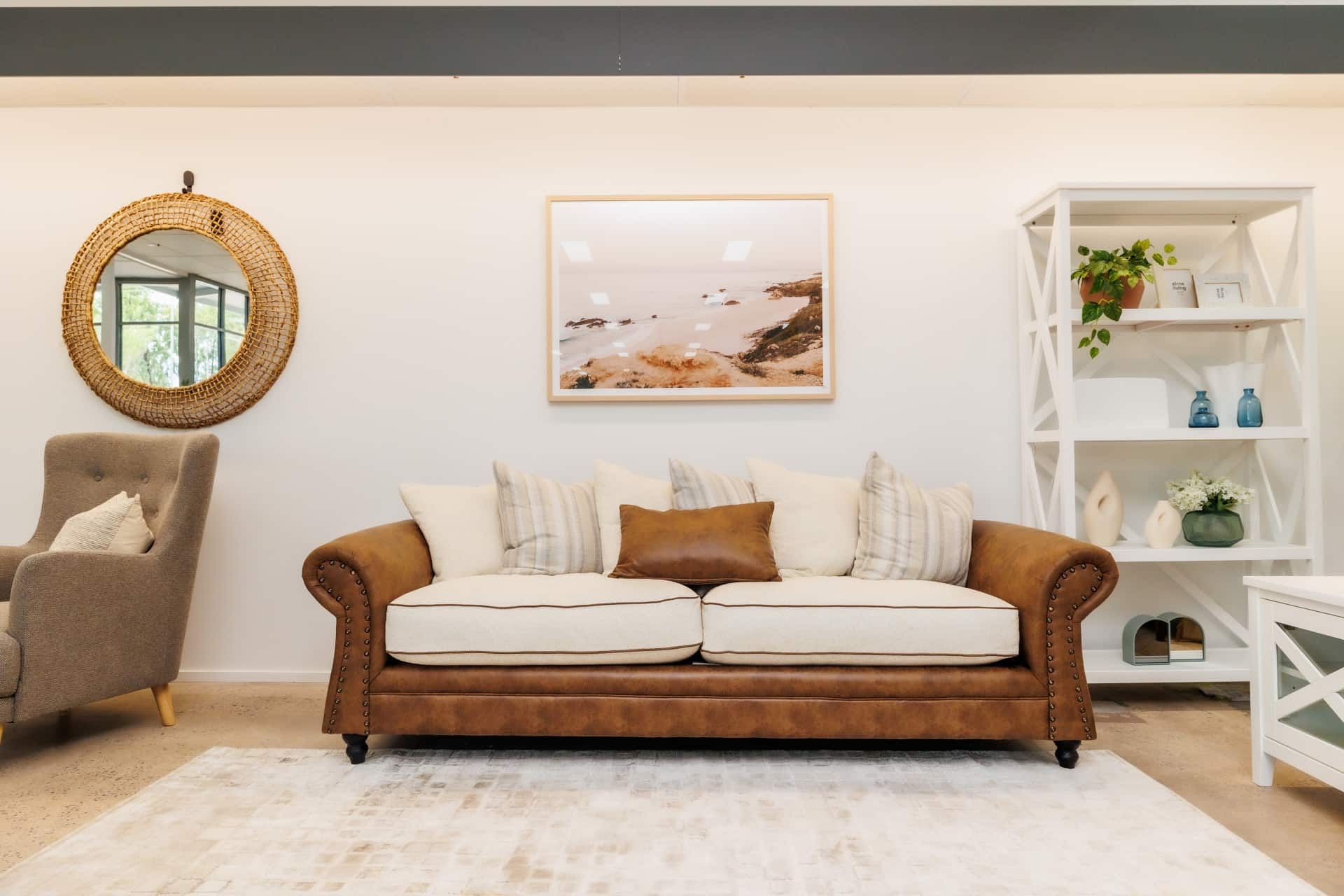 A Living Room With a Brown Leather Couch and a White Rug — The Comfort Zone Darwin In Winnellie, NT
