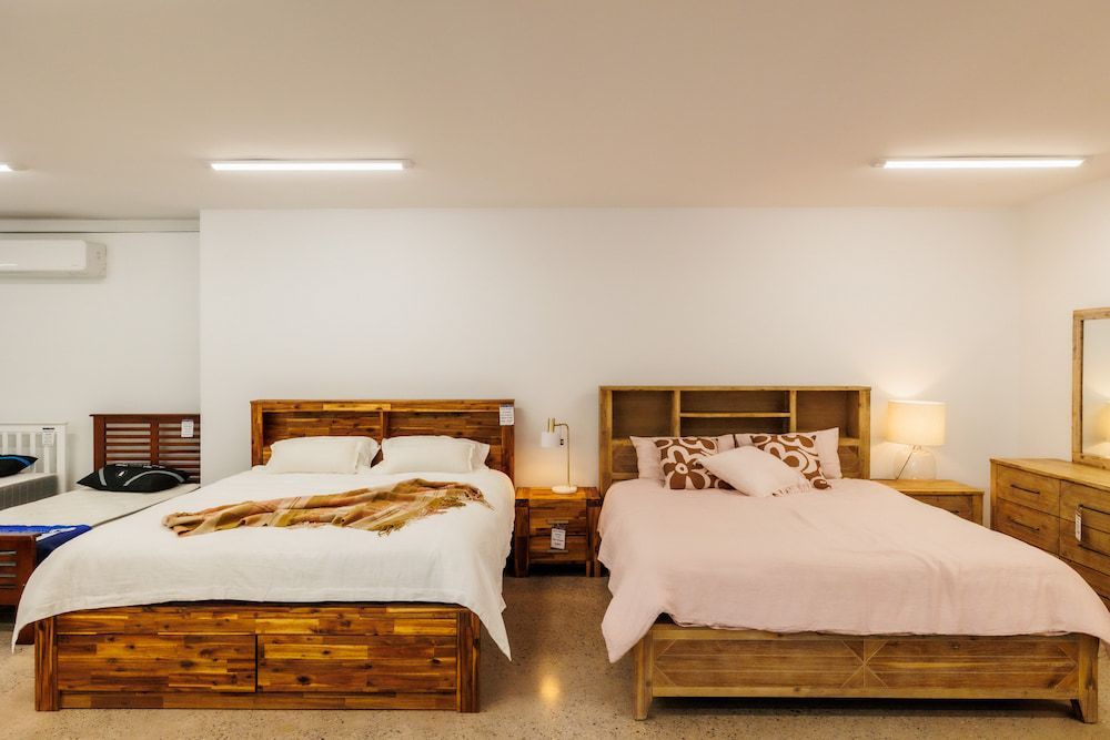 A Bedroom With Two Beds, a Dresser and a Mirror — The Comfort Zone Darwin In Winnellie, NT