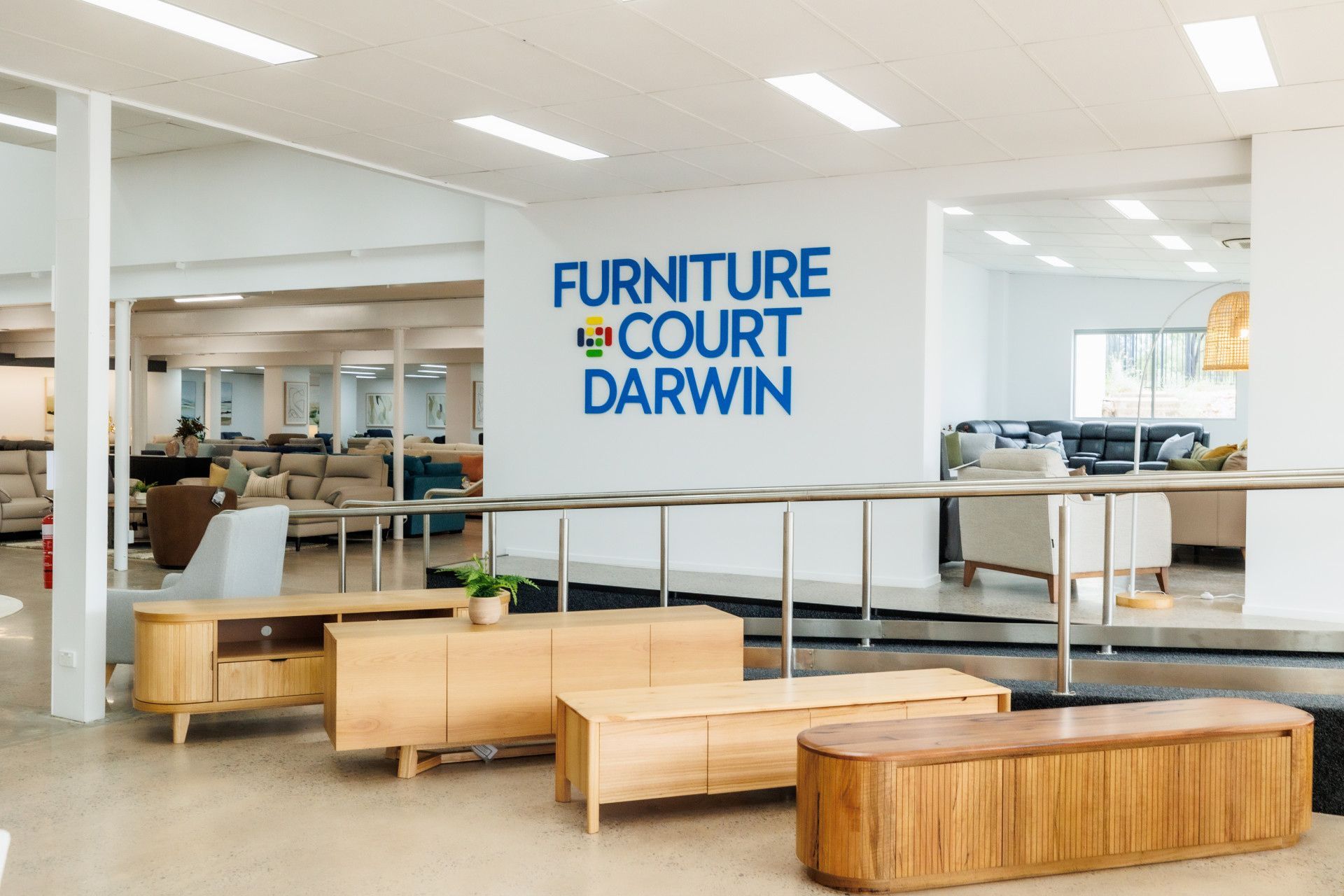 A row of TV cabinets on display in a furniture show room — The Comfort Zone Darwin In Winnellie, NT