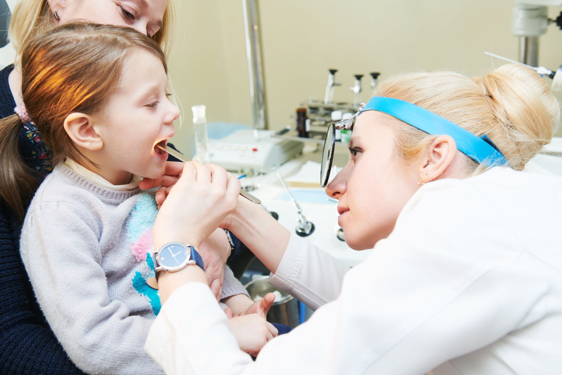 Examination on a child's throat
