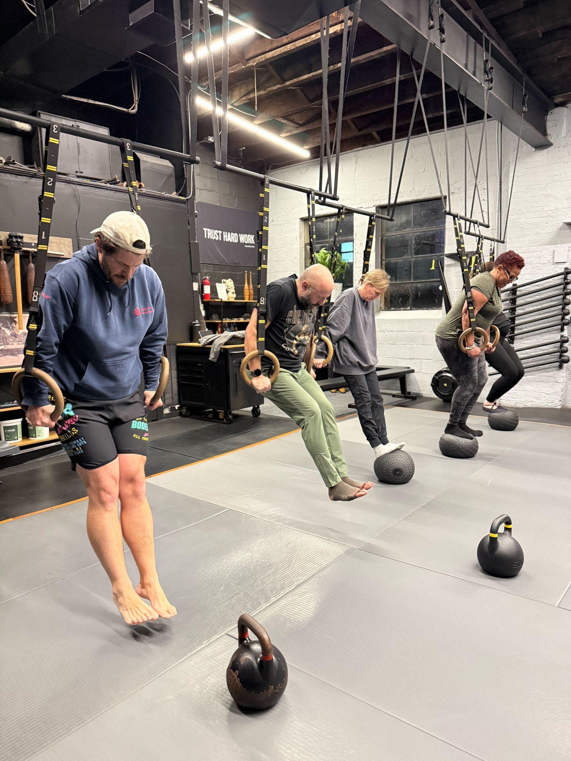 Group training in progress at Soma MVMT in Maplewood, NJ, with coached strength and cardio for motivation.